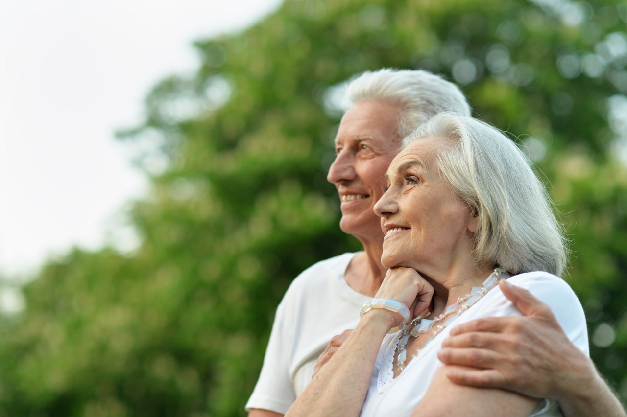 Portrait of beautiful senior couple posing in the park Portrait of beautiful senior couple posing in the park
