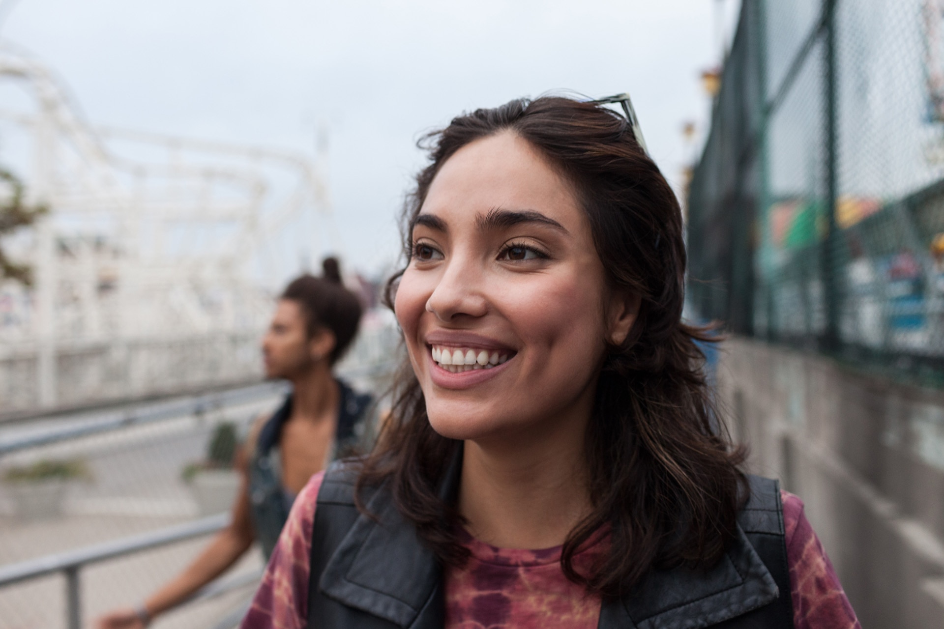 Smiling woman at a fairground