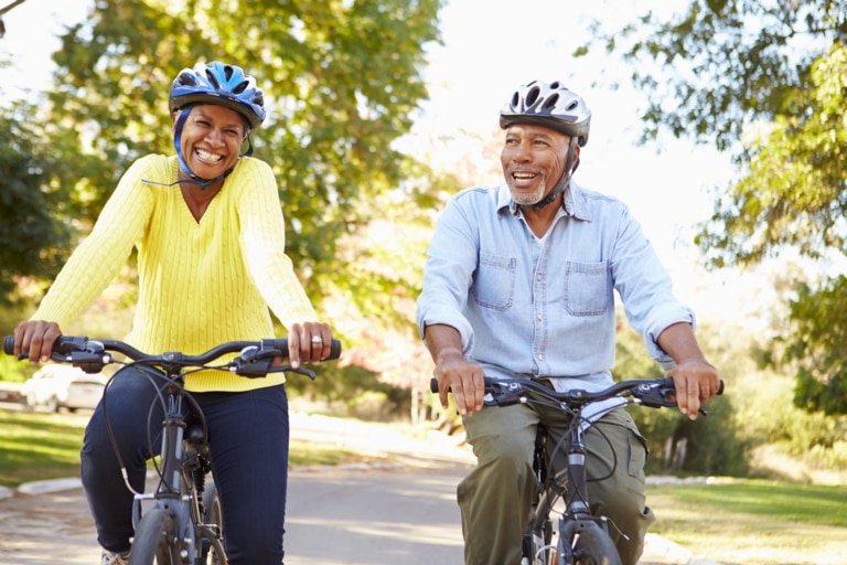 Pair of people biking